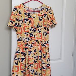 Yellow LuLaRoe Amelia - size Large